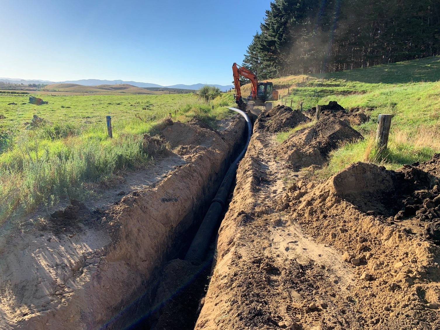 kwp-dec-update-13-installing-pipe-trenching-through-farmland